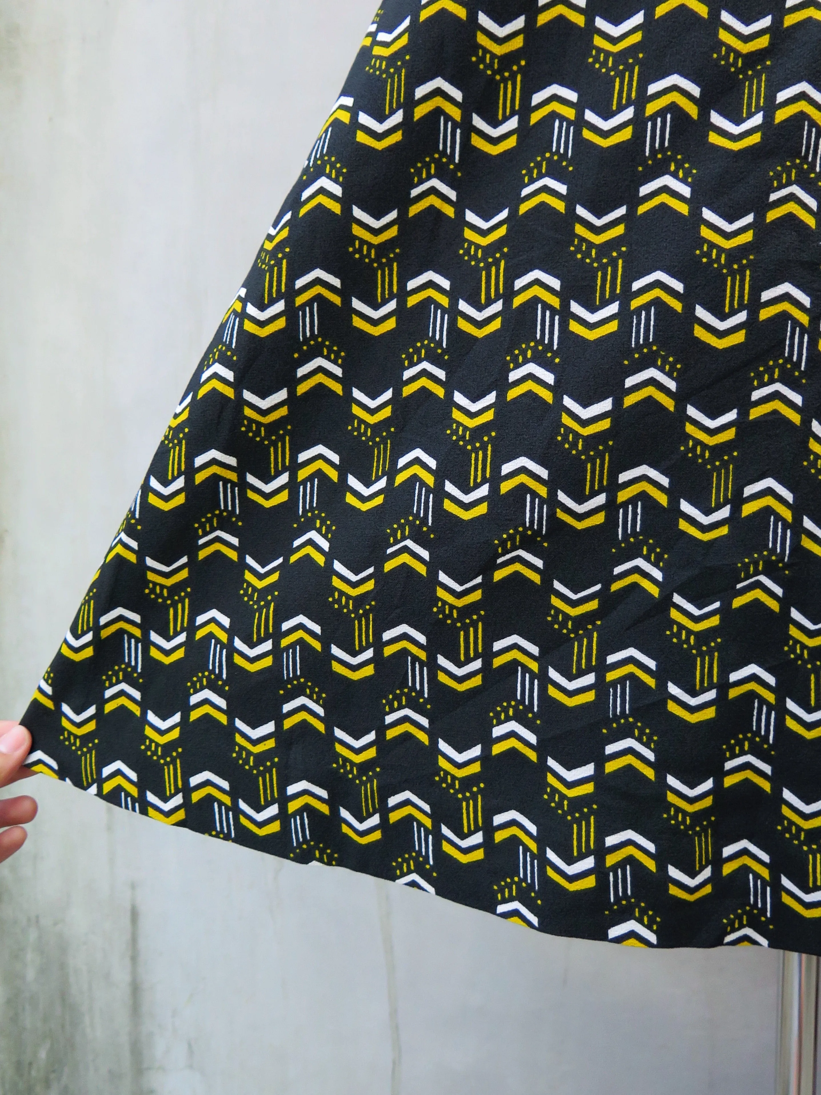 Betty | Vintage 1960s/1970s Black yellow white geometric print sleeveless black dress